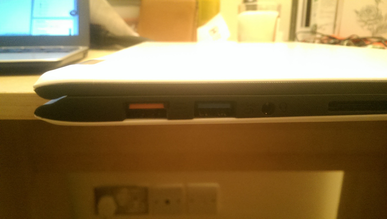 Orange USB port is also the power slot